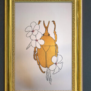 golden beetle in flowers